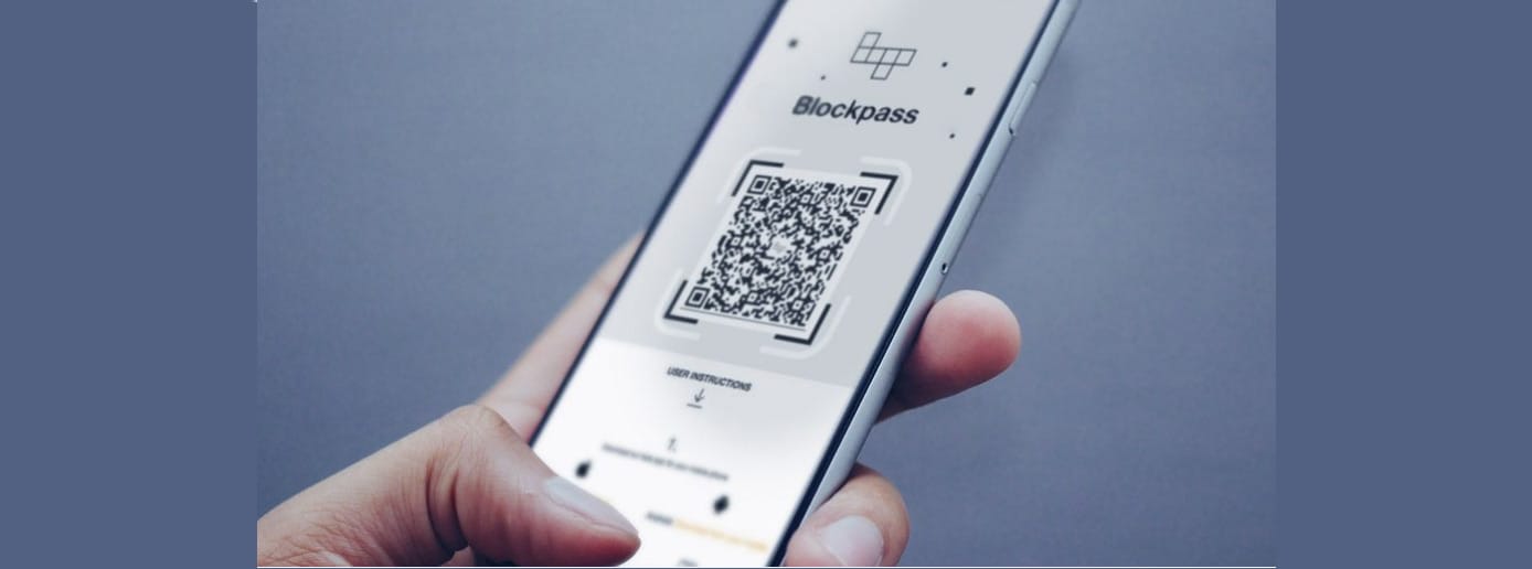 Photo of a mobile phone with Blockpass app Photo of a mobile phone with Blockpass app